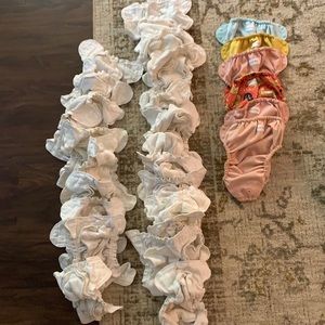 Gently used Esembly cloth diapers, size 1